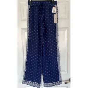 Long navy patterned festival pants — never worn, tags on!